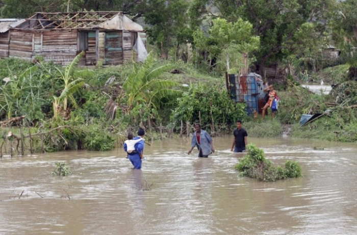 Најмалку 25 лица загинаа во поплавите предизвикани од ураганот Мелиса на Карибите