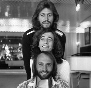На денешен ден во 1987 година, Bee Gees влегоа во историјата како единствениот состав со UK број 1 хит во 60-тите, 70-тите и 80-тите