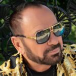 (Фото) Живеел во една соба, а денес има две вили во Србија и стан во Доминиканска Република: Миле Китиќ позира на егзотична дестинација