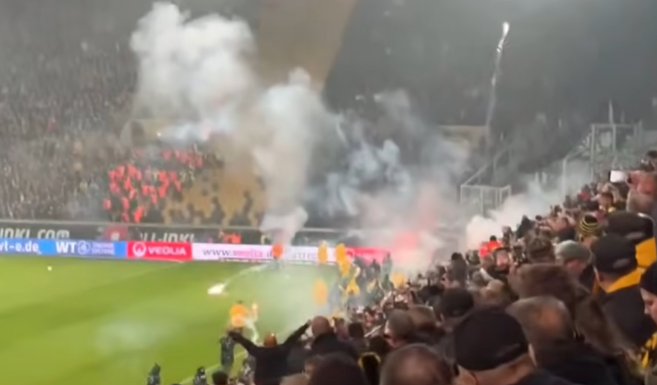 Хаос во Дрезден: Навивачите со пиротехнички средства започнаа пресметка, другите возвратија со влегување на терен (Видео)